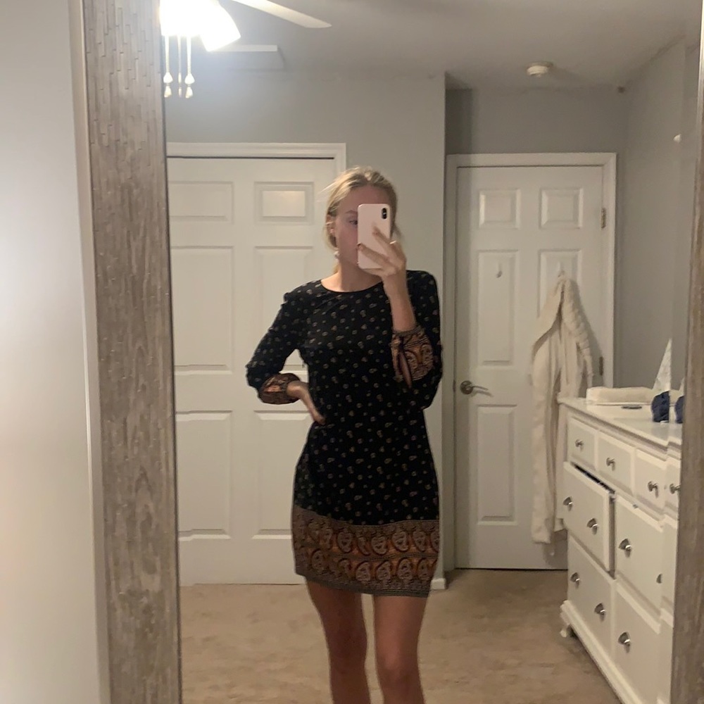 Black patterned long sleeve dress.